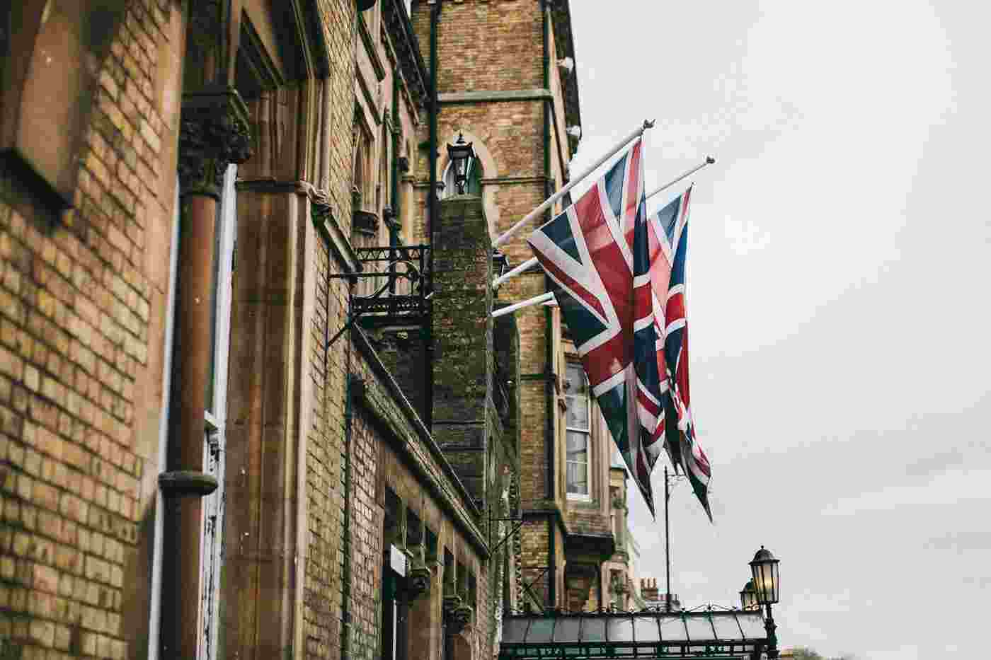 Union jack flag hanging on a building