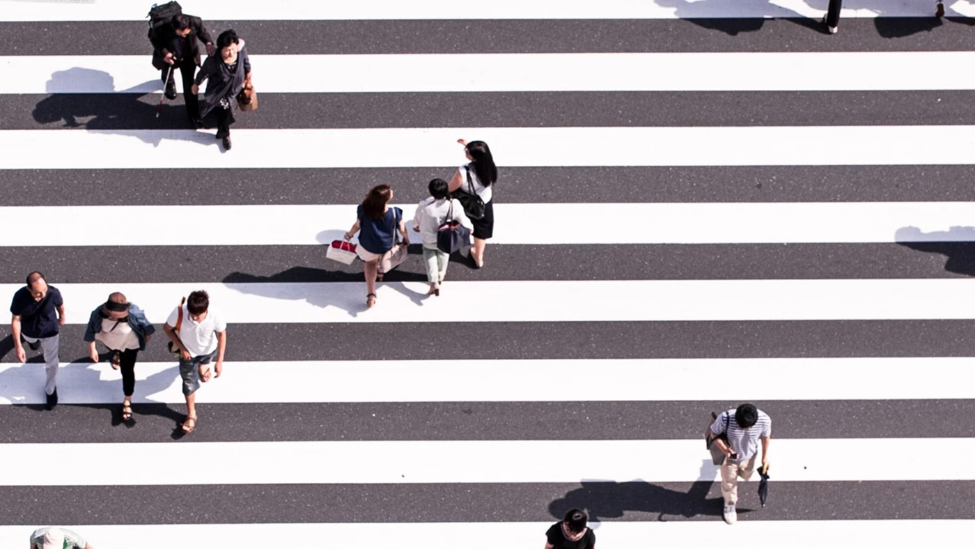 Zebra crossing with business people