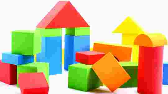 Why do companies set up holding companies?