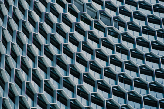 Why do companies set up holding companies?