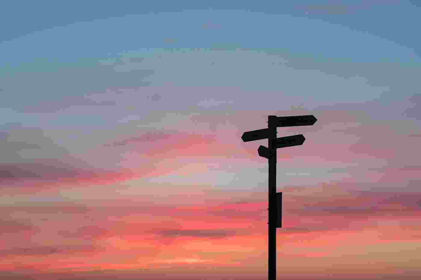 Silhouette of a sign post